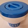 Large tablet dispenser for 200g tri-chlor tablets, blue and white, with adjustable outlet.